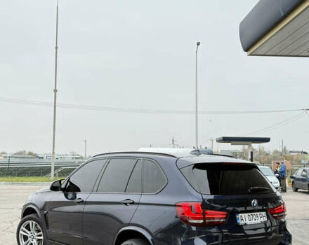 Синий БМВ Х5, объемом двигателя 3 л и пробегом 215 тыс. км за 21000 $, фото 3 на Automoto.ua