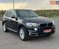 Синий БМВ Х5, объемом двигателя 3 л и пробегом 240 тыс. км за 27300 $, фото 1 на Automoto.ua