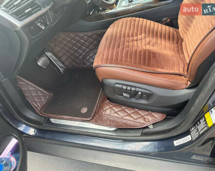 Синій БМВ Х5, об'ємом двигуна 2.98 л та пробігом 171 тис. км за 22977 $, фото 11 на Automoto.ua