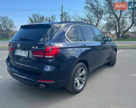 Синій БМВ Х5, об'ємом двигуна 2.98 л та пробігом 171 тис. км за 22977 $, фото 4 на Automoto.ua