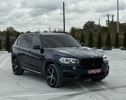 Синий БМВ Х5, объемом двигателя 3 л и пробегом 250 тыс. км за 24900 $, фото 1 на Automoto.ua