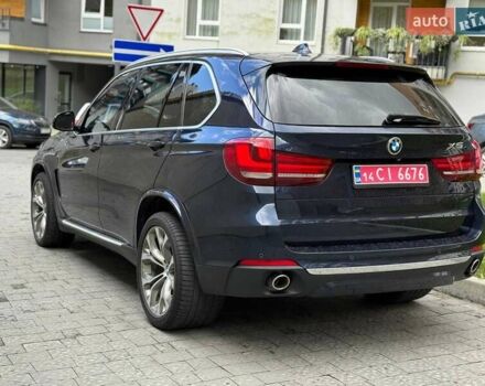 Синій БМВ Х5, об'ємом двигуна 3 л та пробігом 248 тис. км за 26000 $, фото 4 на Automoto.ua