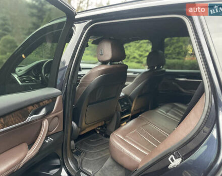 Синій БМВ Х5, об'ємом двигуна 2 л та пробігом 267 тис. км за 27500 $, фото 4 на Automoto.ua