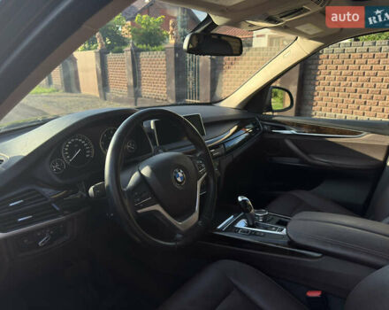 Синий БМВ Х5, объемом двигателя 2.99 л и пробегом 228 тыс. км за 27000 $, фото 4 на Automoto.ua