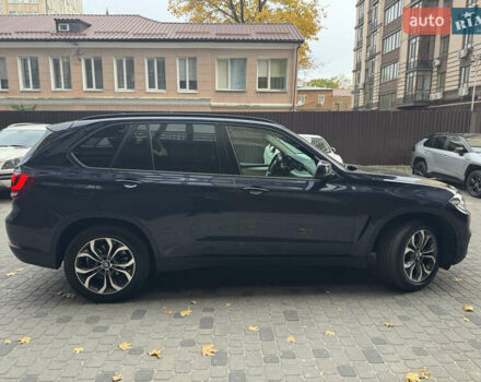 Синій БМВ Х5, об'ємом двигуна 2 л та пробігом 100 тис. км за 29999 $, фото 13 на Automoto.ua