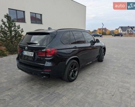 Синий БМВ Х5, объемом двигателя 2.99 л и пробегом 290 тыс. км за 30950 $, фото 4 на Automoto.ua