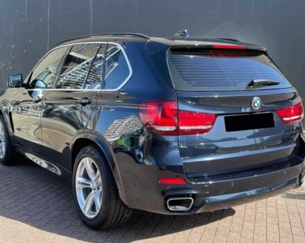 Синій БМВ Х5, об'ємом двигуна 3 л та пробігом 85 тис. км за 21450 $, фото 2 на Automoto.ua