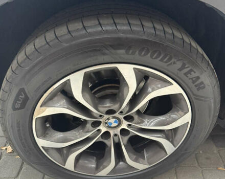 Синій БМВ Х5, об'ємом двигуна 2 л та пробігом 100 тис. км за 29999 $, фото 12 на Automoto.ua