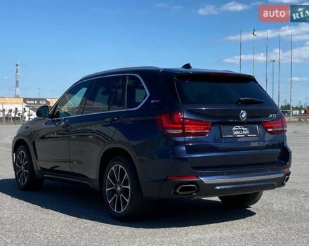 Синий БМВ Х5, объемом двигателя 2 л и пробегом 154 тыс. км за 32900 $, фото 6 на Automoto.ua
