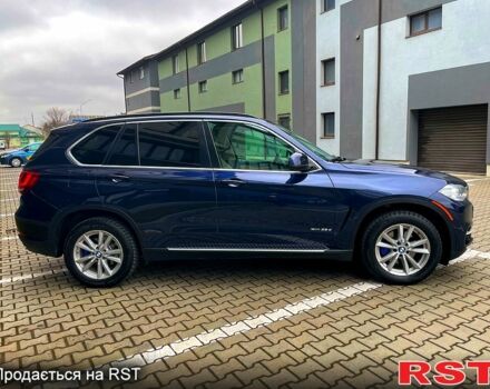 Синій БМВ Х5, об'ємом двигуна 3 л та пробігом 260 тис. км за 24499 $, фото 2 на Automoto.ua