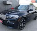 Синій БМВ Х5, об'ємом двигуна 2 л та пробігом 190 тис. км за 26900 $, фото 1 на Automoto.ua
