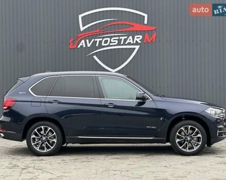 Синий БМВ Х5, объемом двигателя 2 л и пробегом 151 тыс. км за 32900 $, фото 2 на Automoto.ua