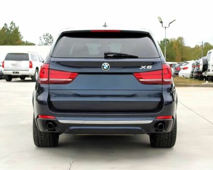 Синий БМВ Х5, объемом двигателя 3 л и пробегом 58 тыс. км за 17300 $, фото 5 на Automoto.ua
