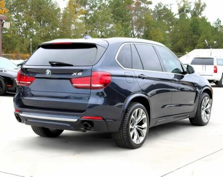Синий БМВ Х5, объемом двигателя 3 л и пробегом 58 тыс. км за 17300 $, фото 4 на Automoto.ua