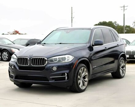 Синий БМВ Х5, объемом двигателя 3 л и пробегом 58 тыс. км за 17300 $, фото 2 на Automoto.ua