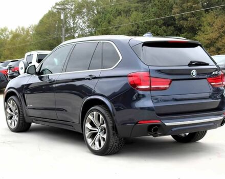 Синий БМВ Х5, объемом двигателя 3 л и пробегом 58 тыс. км за 17300 $, фото 6 на Automoto.ua