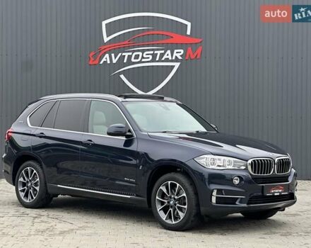 Синий БМВ Х5, объемом двигателя 2 л и пробегом 151 тыс. км за 32900 $, фото 1 на Automoto.ua