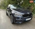 Синий БМВ Х5, объемом двигателя 3 л и пробегом 128 тыс. км за 37000 $, фото 2 на Automoto.ua