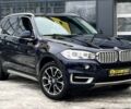 Синий БМВ Х5, объемом двигателя 3 л и пробегом 102 тыс. км за 37900 $, фото 1 на Automoto.ua