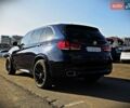 Синій БМВ Х5, об'ємом двигуна 3 л та пробігом 133 тис. км за 29950 $, фото 4 на Automoto.ua