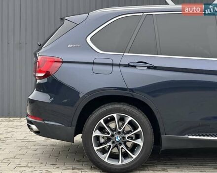 Синий БМВ Х5, объемом двигателя 2 л и пробегом 151 тыс. км за 32900 $, фото 4 на Automoto.ua
