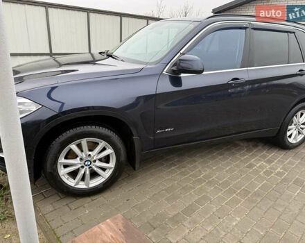 Синій БМВ Х5, об'ємом двигуна 2 л та пробігом 66 тис. км за 39500 $, фото 2 на Automoto.ua