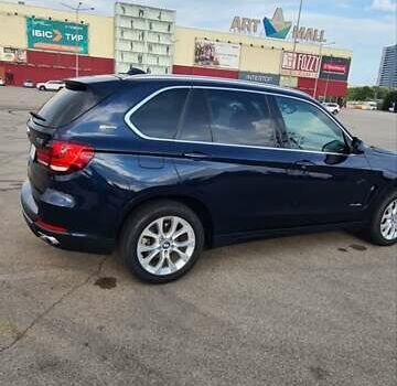 Синий БМВ Х5, объемом двигателя 2 л и пробегом 54 тыс. км за 37300 $, фото 24 на Automoto.ua