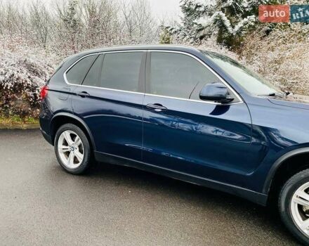Синій БМВ Х5, об'ємом двигуна 2 л та пробігом 78 тис. км за 35950 $, фото 5 на Automoto.ua