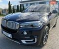 Синий БМВ Х5, объемом двигателя 3 л и пробегом 145 тыс. км за 26300 $, фото 1 на Automoto.ua