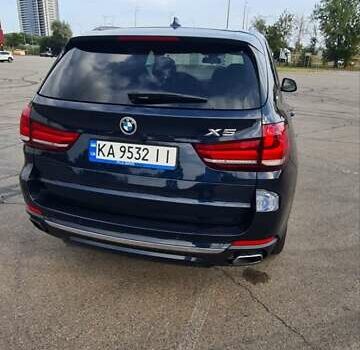 Синий БМВ Х5, объемом двигателя 2 л и пробегом 54 тыс. км за 37300 $, фото 13 на Automoto.ua
