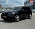 Синий БМВ Х5, объемом двигателя 3 л и пробегом 230 тыс. км за 34940 $, фото 1 на Automoto.ua