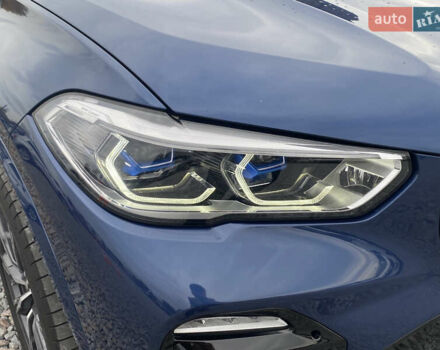 Синій БМВ Х5, об'ємом двигуна 3 л та пробігом 119 тис. км за 57000 $, фото 1 на Automoto.ua