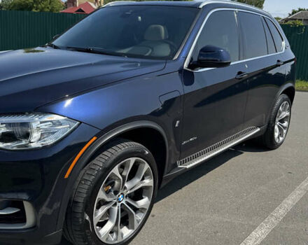 Синій БМВ Х5, об'ємом двигуна 2 л та пробігом 187 тис. км за 34000 $, фото 4 на Automoto.ua