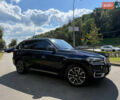 Синій БМВ Х5, об'ємом двигуна 3 л та пробігом 130 тис. км за 33000 $, фото 3 на Automoto.ua
