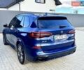 Синій БМВ Х5, об'ємом двигуна 3 л та пробігом 212 тис. км за 41500 $, фото 2 на Automoto.ua