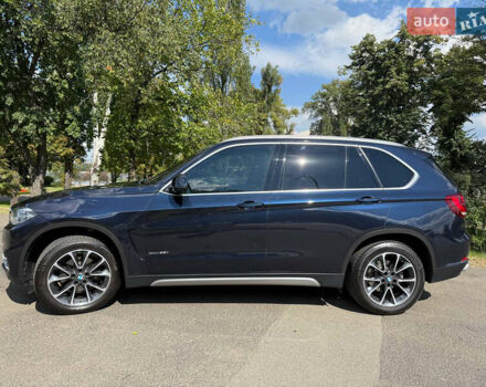 Синій БМВ Х5, об'ємом двигуна 3 л та пробігом 130 тис. км за 33000 $, фото 5 на Automoto.ua