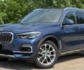 Синий БМВ Х5, объемом двигателя 3 л и пробегом 50 тыс. км за 39100 $, фото 1 на Automoto.ua