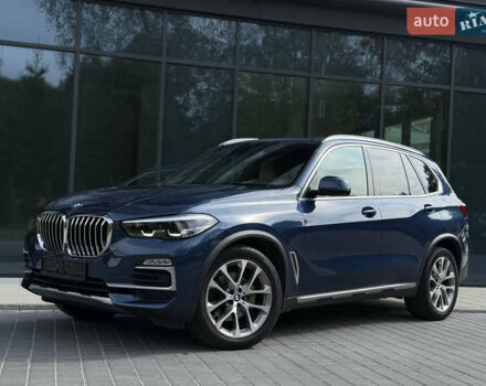 Синий БМВ Х5, объемом двигателя 3 л и пробегом 138 тыс. км за 45900 $, фото 1 на Automoto.ua