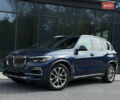 Синий БМВ Х5, объемом двигателя 3 л и пробегом 138 тыс. км за 45900 $, фото 1 на Automoto.ua