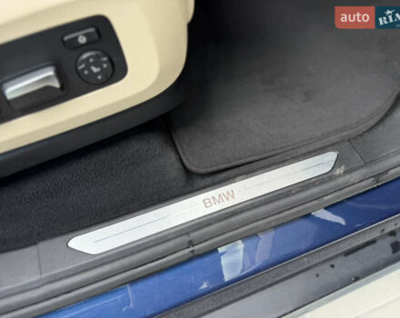 Синий БМВ Х5, объемом двигателя 3 л и пробегом 138 тыс. км за 45900 $, фото 74 на Automoto.ua