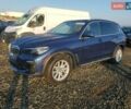 Синій БМВ Х5, об'ємом двигуна 2 л та пробігом 45 тис. км за 18200 $, фото 1 на Automoto.ua