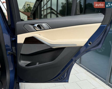 Синий БМВ Х5, объемом двигателя 3 л и пробегом 138 тыс. км за 45900 $, фото 70 на Automoto.ua