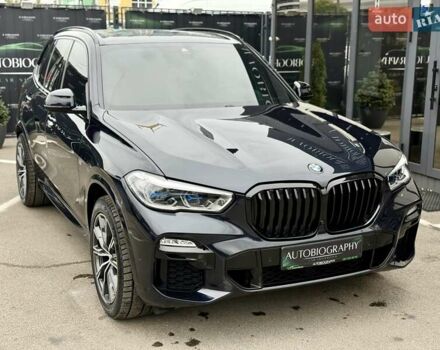 Синий БМВ Х5, объемом двигателя 3 л и пробегом 103 тыс. км за 55900 $, фото 2 на Automoto.ua