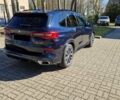 Синій БМВ Х5, об'ємом двигуна 3 л та пробігом 65 тис. км за 21950 $, фото 4 на Automoto.ua