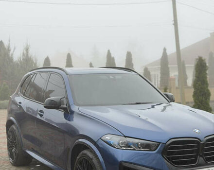 Синій БМВ Х5, об'ємом двигуна 3 л та пробігом 57 тис. км за 59999 $, фото 6 на Automoto.ua