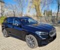 Синій БМВ Х5, об'ємом двигуна 3 л та пробігом 65 тис. км за 21950 $, фото 1 на Automoto.ua