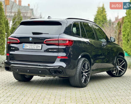 Синий БМВ Х5, объемом двигателя 3 л и пробегом 70 тыс. км за 51500 $, фото 2 на Automoto.ua