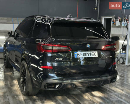 Синий БМВ Х5, объемом двигателя 3 л и пробегом 97 тыс. км за 51000 $, фото 2 на Automoto.ua