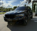 Синій БМВ Х5, об'ємом двигуна 3 л та пробігом 111 тис. км за 56000 $, фото 2 на Automoto.ua