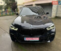 Синий БМВ Х5, объемом двигателя 3 л и пробегом 112 тыс. км за 51000 $, фото 2 на Automoto.ua